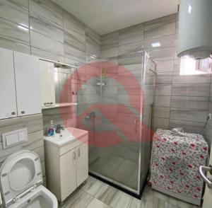 Phòng tắm tại Cozzy Apartment