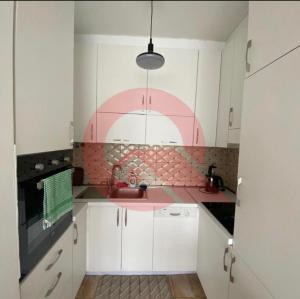 Η κουζίνα ή μικρή κουζίνα στο Cozzy Apartment