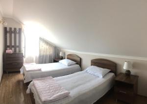 Letto o letti in una camera di Mari Guest House