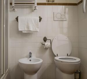 Koupelna v ubytování Hotel 4 Coronati