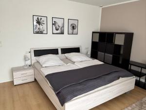 Postel nebo postele na pokoji v ubytování Tor zum Schwarzwald und in die Schweiz