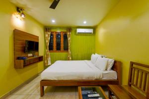 Postel nebo postele na pokoji v ubytování White yellow residency + 35 fotografií