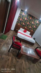 Ένα ή περισσότερα κρεβάτια σε δωμάτιο στο HOTEL Shooting Karni Range