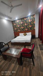 Ένα ή περισσότερα κρεβάτια σε δωμάτιο στο HOTEL Shooting Karni Range