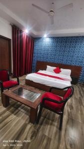 Ένα ή περισσότερα κρεβάτια σε δωμάτιο στο HOTEL Shooting Karni Range