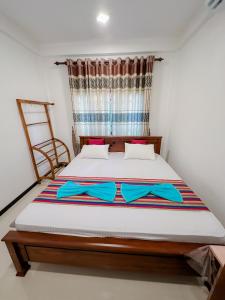 Ένα ή περισσότερα κρεβάτια σε δωμάτιο στο Nature Villa Hiriketiya