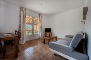 Χώρος καθιστικού στο Maison au calme avec piscine et climatisation