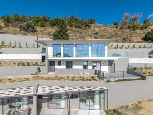an aerial view of a house with a hill in the background at Dione Villa in Sellía