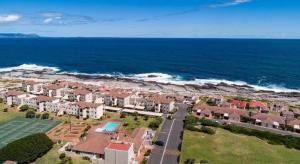 an aerial view of a house by the ocean at Unit 8 Hermanus Beach Club in Hermanus