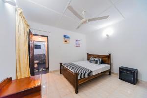 Postel nebo postele na pokoji v ubytování Cloud Inn Kandy Homestay - Kandy Perahera 2025