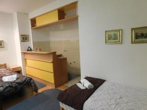 מיטה או מיטות בחדר ב-Apartment Sabina