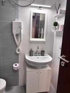 Koupelna v ubytování Belvedere Holiday Club H80