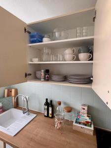 Kuchyň nebo kuchyňský kout v ubytování Ferienwohnung Urlaubskönner - Chiemgaukarte + 6 fotografií