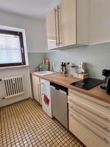 Kuchyň nebo kuchyňský kout v ubytování Ferienwohnung Urlaubskönner - Chiemgaukarte