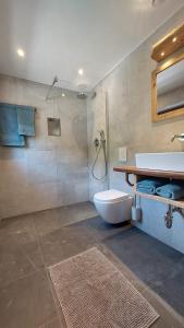 Koupelna v ubytování Alpenchalet Almrose