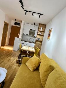 Kuchyň nebo kuchyňský kout v ubytování Gold Apartman