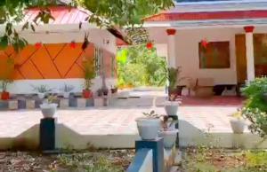 a view of a house with a patio at ETERNA Homestay Rackad in Mūvattupula