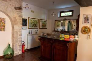 a kitchen with a counter in a room at Agriturismo Roccagelli in Vallo di Nera