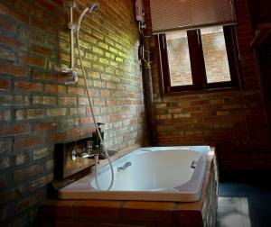 Koupelna v ubytování Kung Nok Tha Resort Nakhon Si Thammarat + 49 fotografií