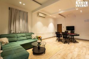 Μια τηλεόραση ή/και κέντρο ψυχαγωγίας στο Sammaya by VEO - Part of StayVista