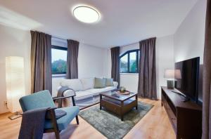 Μια τηλεόραση ή/και κέντρο ψυχαγωγίας στο Apartment Aš centrum