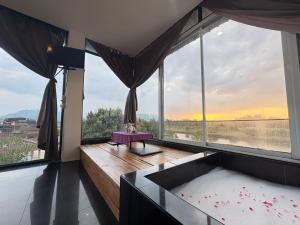 Postel nebo postele na pokoji v ubytování Nava Tara Resort