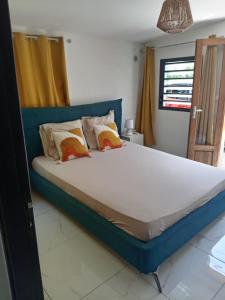 Postel nebo postele na pokoji v ubytování La Petite Case Tomi + 28 fotografií