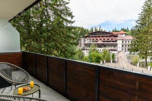 En balkon eller terrasse på Poiana View Apartment