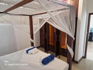 Ένα ή περισσότερα κρεβάτια σε δωμάτιο στο Simba Kenia Luxury Apartment +13 φωτογραφίες