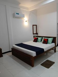 Ένα ή περισσότερα κρεβάτια σε δωμάτιο στο Lake View Eco Lodge