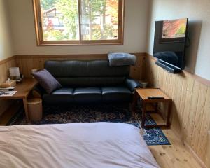 Μια τηλεόραση ή/και κέντρο ψυχαγωγίας στο 離れの宿 かぶろの庭 離れの宿 KuRA