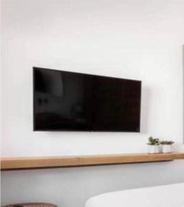 TV a/nebo společenská místnost v ubytování SEA HOME Accommodation