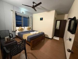 Postel nebo postele na pokoji v ubytování Hotel O Ram residency