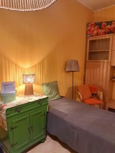 Postel nebo postele na pokoji v ubytování Appartamento San Quirico