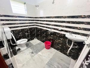 Koupelna v ubytování Hotel O Fakir Guest House