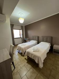 Postel nebo postele na pokoji v ubytování B&B Altamarea