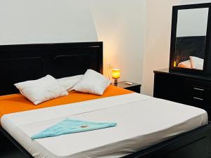 Giường trong phòng chung tại Luxor Adventure Guest House