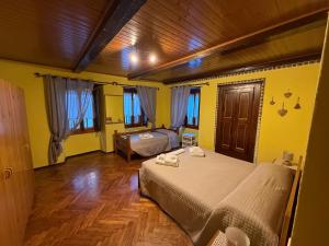 Ένα ή περισσότερα κρεβάτια σε δωμάτιο στο Il Camino