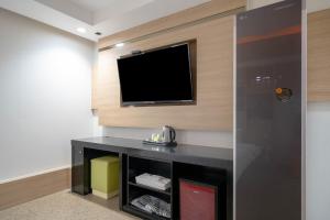 a hotel room with a flat screen tv on a wall at Changwon Ava Hotel in Changwon +43 photos