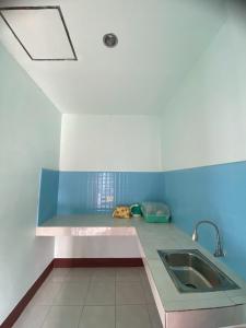 Η κουζίνα ή μικρή κουζίνα στο Hassana Garden Home