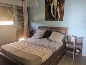 Postel nebo postele na pokoji v ubytování Sunset974