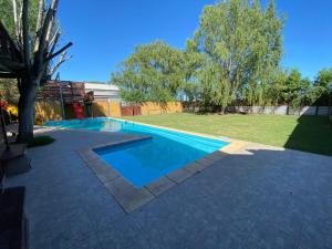 Bazén v ubytování Complejo Maranatha nebo v jeho okolí