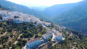 an aerial view of a town on a mountain at Hotel Rural Mirador de Jubrique in Jubrique