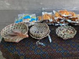 a group of three baskets sitting on the floor at "Saporkren Homestay Raja Ampat" in Tapokreng