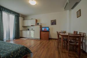 Kuchyň nebo kuchyňský kout v ubytování Park Hotel Perù ***S