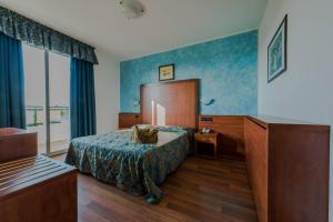 Postel nebo postele na pokoji v ubytování Park Hotel Perù ***S