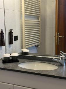 Koupelna v ubytování Aria Life Hotel Pinzolo + 22 fotografií