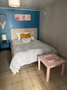 Postel nebo postele na pokoji v ubytování La Ligonne