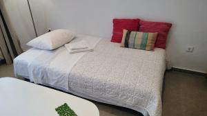 Postel nebo postele na pokoji v ubytování Kleopatra's residence