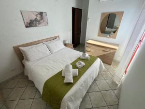 Ένα ή περισσότερα κρεβάτια σε δωμάτιο στο BelHome +10 φωτογραφίες